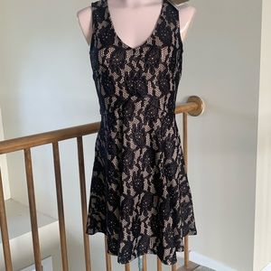 New with tag stretch nude with black lace.